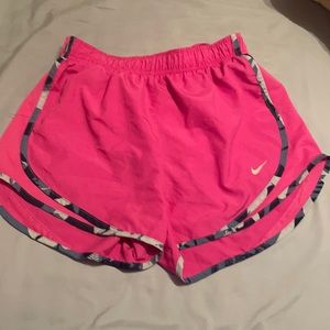 pink NIKE tempo shorts